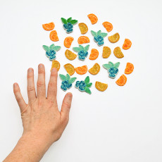 23_ hand with tiny fruits 2